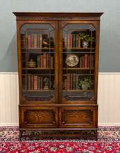 Load image into Gallery viewer, Antique English Jacobean Bookcase Cabinet Double Door Wavy Glass Tiger Oak 1930s