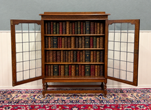 Load image into Gallery viewer, Antique English Bookcase Cabinet Double Door Leaded Wavy Glass Oak c.1930s