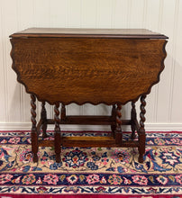 Load image into Gallery viewer, Antique English Table Drop Leaf Gateleg Pie Crust Top Barley Twist Oak c. 1930s