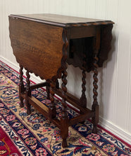 Load image into Gallery viewer, Antique English Table Drop Leaf Gateleg Pie Crust Top Barley Twist Oak c. 1930s