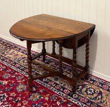 Load image into Gallery viewer, Antique English Table Drop Leaf Gateleg Barley Twist Tiger Oak Oval c. 1920-30s