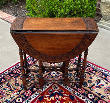 Load image into Gallery viewer, Antique English Table Drop Leaf Gateleg Turned Post Carved Top Oak Oval