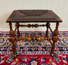 Load image into Gallery viewer, Antique English Rush Seat Bench Stool Joint Stool Turned Leg Carved Oak c. 1930s