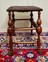 Load image into Gallery viewer, Antique English Rush Seat Bench Stool Joint Stool Turned Leg Carved Oak c. 1930s