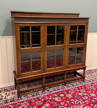 Load image into Gallery viewer, Antique English Jacobean Bookcase Bookshelf Cabinet Triple Glass Door Oak c1930s
