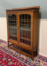 Load image into Gallery viewer, Antique English Bookcase Cabinet Double Door Leaded Wavy Glass Oak c.1930s