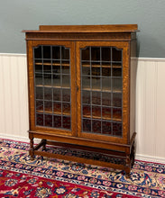 Load image into Gallery viewer, Antique English Bookcase Cabinet Double Door Leaded Wavy Glass Oak c.1930s