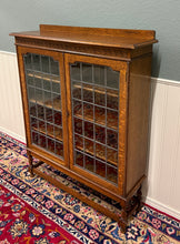 Load image into Gallery viewer, Antique English Bookcase Cabinet Double Door Leaded Wavy Glass Oak c.1930s