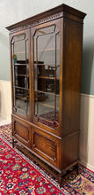 Load image into Gallery viewer, Antique English Jacobean Bookcase Cabinet Double Door Wavy Glass Tiger Oak 1930s
