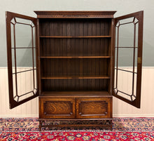 Load image into Gallery viewer, Antique English Jacobean Bookcase Cabinet Double Door Wavy Glass Tiger Oak 1930s