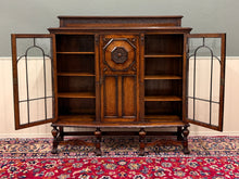 Load image into Gallery viewer, Antique English Jacobean Bookcase Bow Front Cabinet Triple Door Oak c1930s