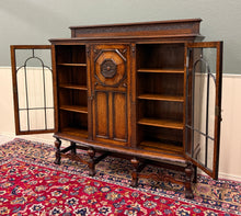 Load image into Gallery viewer, Antique English Jacobean Bookcase Bow Front Cabinet Triple Door Oak c1930s
