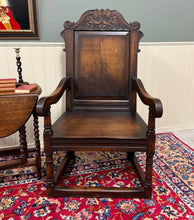 Load image into Gallery viewer, Antique Pair of English Carved Oak Wainscot Highbacked Armchairs c. 1900-1920