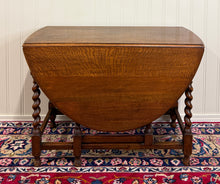 Load image into Gallery viewer, Antique English Large Table Drop Leaf Gateleg Barley Twist Oak Oval c. 1920-30s
