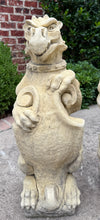 Load image into Gallery viewer, Vintage English Statues Garden Figures Gargoyles Shield Cast Stone Pair