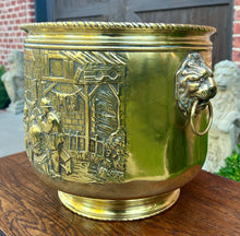 Load image into Gallery viewer, Antique English Brass Planter Lion Heads Flowerpot Pub Scenes c.1930