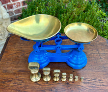 Load image into Gallery viewer, Antique English Shop Scale 7 Graduated Weights With Brass Pans Blue