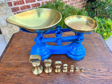 Load image into Gallery viewer, Antique English Shop Scale 7 Graduated Weights With Brass Pans Blue