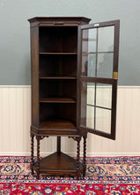 Load image into Gallery viewer, Antique English Jacobean Corner Cabinet Barley Twist Legs Glass Door Oak 1920s