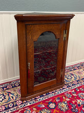 Load image into Gallery viewer, Antique English Corner Cabinet Carved Oak Hanging Wall Cabinet Storage c.1920s