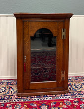 Load image into Gallery viewer, Antique English Corner Cabinet Carved Oak Hanging Wall Cabinet Storage c.1920s