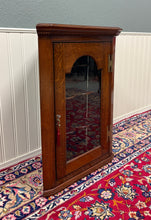 Load image into Gallery viewer, Antique English Corner Cabinet Carved Oak Hanging Wall Cabinet Storage c.1920s
