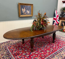 Load image into Gallery viewer, Antique English Butterfly Leaf Oval Carved Dining Table 118" Tiger Oak c1920-30s
