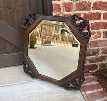Load image into Gallery viewer, Antique English Wall Mirror Beveled Framed Oak Open Carved Corners Octagonal