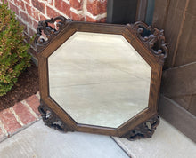 Load image into Gallery viewer, Antique English Wall Mirror Beveled Framed Oak Open Carved Corners Octagonal