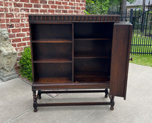 Load image into Gallery viewer, Antique English Bookcase Cabinet Hinged Hidden Storage Barley Twist Oak c. 1920s