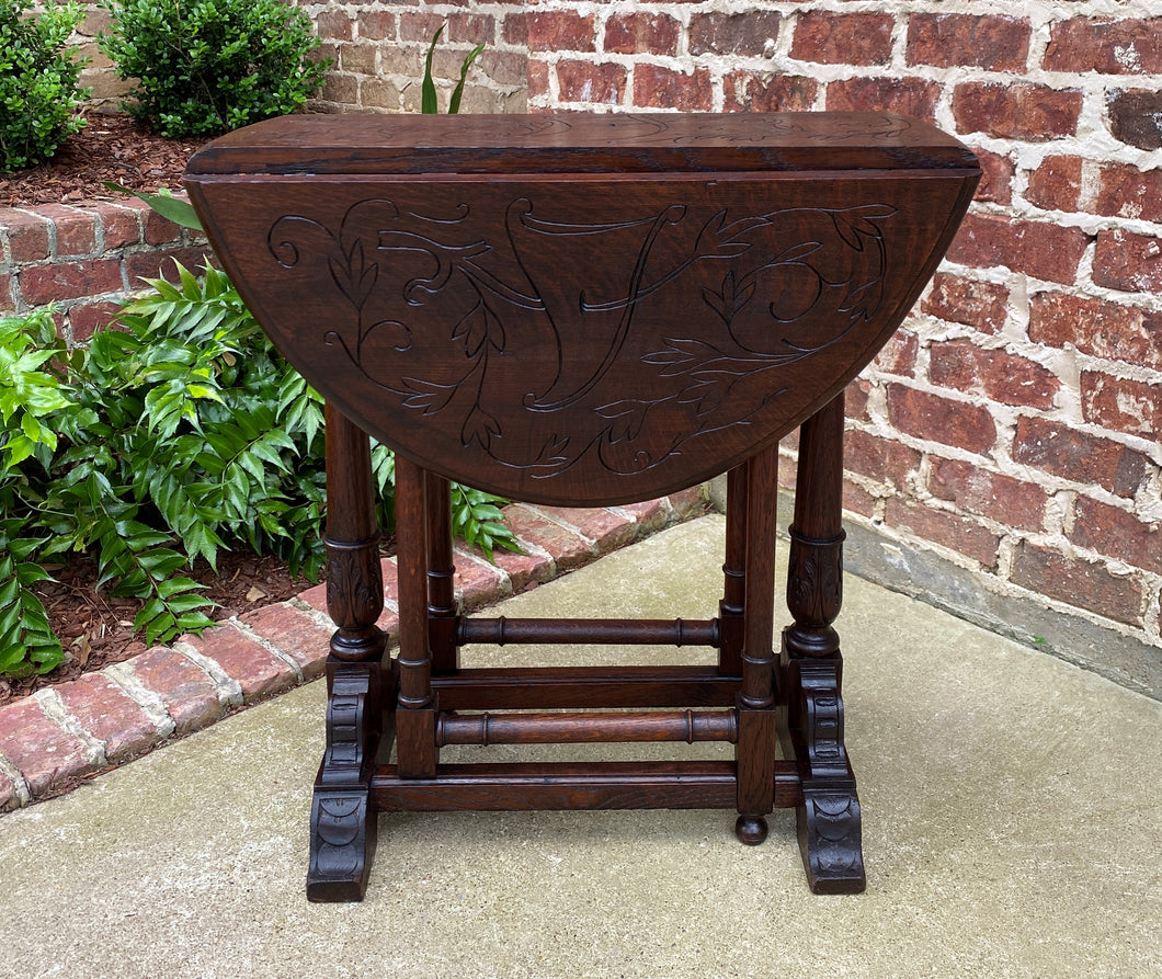 Antique English Table Drop Leaf Gateleg Turned Post Carved Top Trestle Base Oak