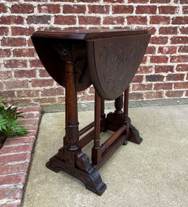 Antique English Table Drop Leaf Gateleg Turned Post Carved Top Trestle Base Oak