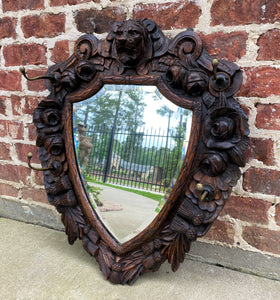 Antique English Mirror Renaissance Revival Oak Frame Shield Shape Lion Wood Back