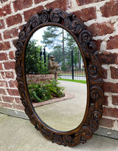 Load image into Gallery viewer, Antique English Mirror OVAL Carved Oak Frame Wood Back Edwardian Era