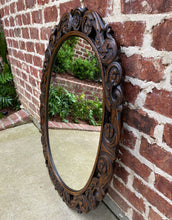 Load image into Gallery viewer, Antique English Mirror OVAL Carved Oak Frame Wood Back Edwardian Era