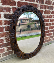 Load image into Gallery viewer, Antique English Mirror OVAL Carved Oak Frame Wood Back Edwardian Era