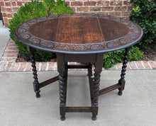 Load image into Gallery viewer, Antique English Table Drop Leaf Gateleg Barley Twist Oval Carved Top Oak 1920s