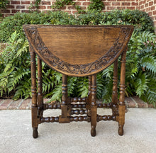 Load image into Gallery viewer, Antique English Table Drop Leaf Gate Leg Carved Top Oval PETITE Oak c. 1920s