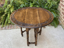 Load image into Gallery viewer, Antique English Table Drop Leaf Gate Leg Carved Top Oval PETITE Oak c. 1920s