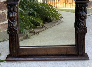 Antique English Mirror Renaissance Revival Oak Frame Figural Carvings Wood Back