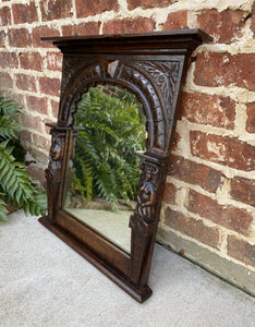 Antique English Mirror Renaissance Revival Oak Frame Figural Carvings Wood Back