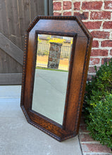 Load image into Gallery viewer, Antique English Mirror Jacobean Carved Oak Framed Beveled Mirror Octagonal 1930s